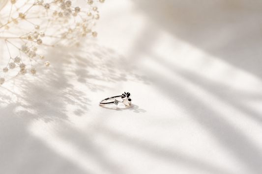Fortune Bloom: The Lucky Clover Solitaire Ring