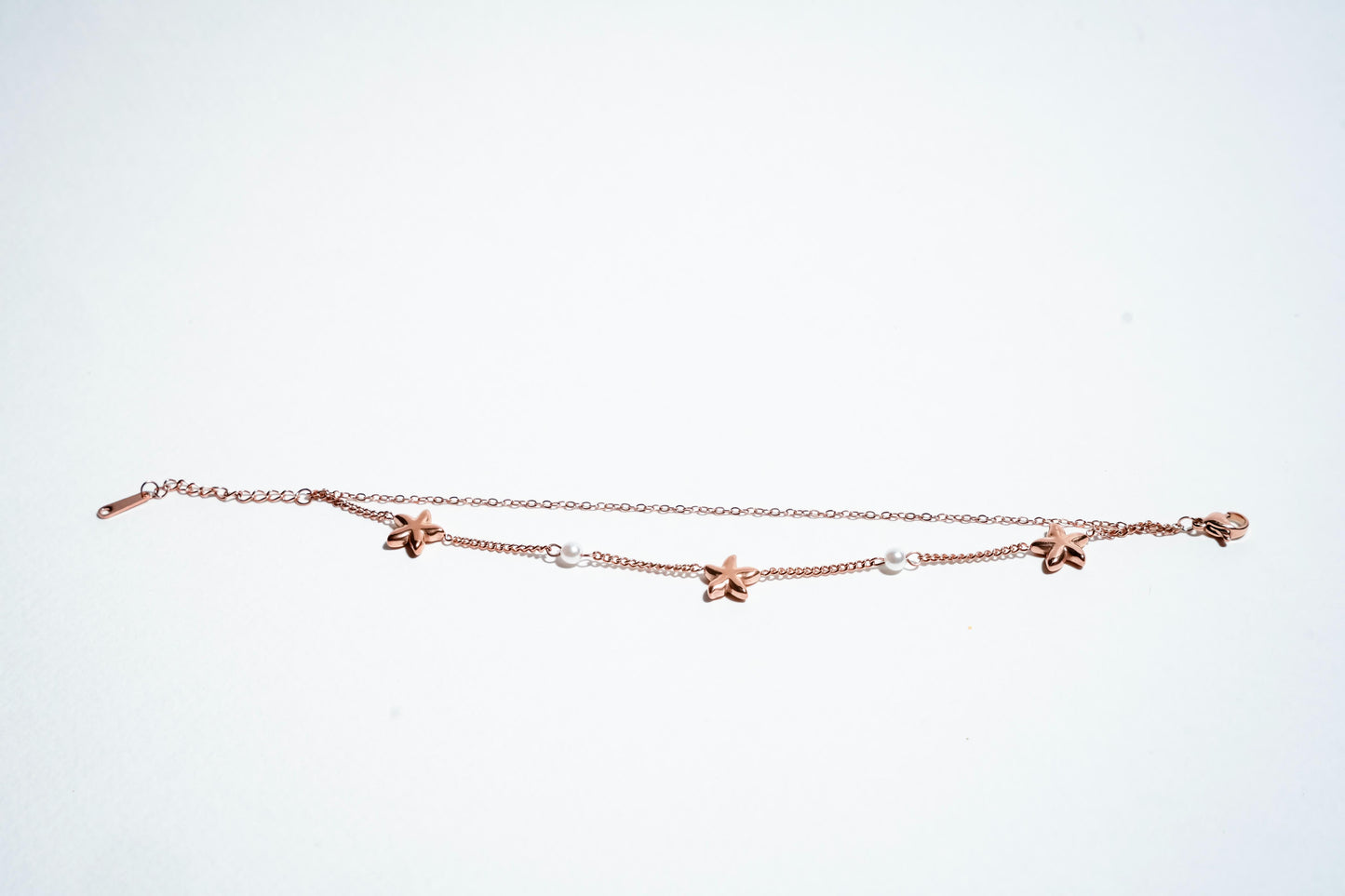 Starlit Dreams: Celestial Pearl & Star Layered Bracelet