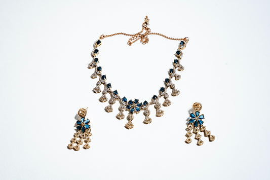 Azure Blossom Radiance: 18k Gold-Plated Crystal Floral Necklace & Earring Set