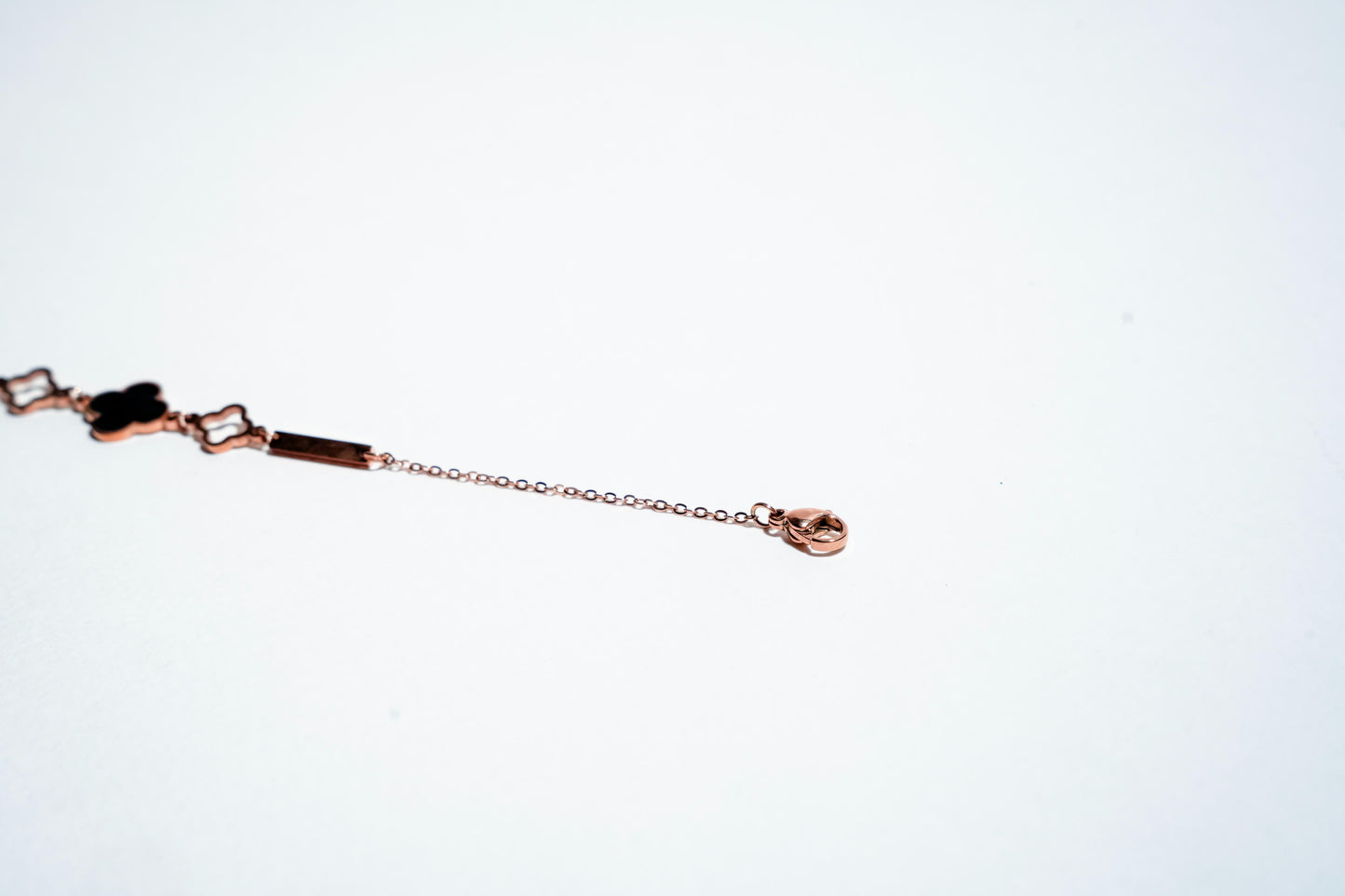 Fortune’s Bloom: Rose Gold-Plated Clover Statement Bracelet