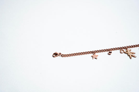 Whimsical Wonders: Rose Gold-Plated Celestial Charm Bracelet
