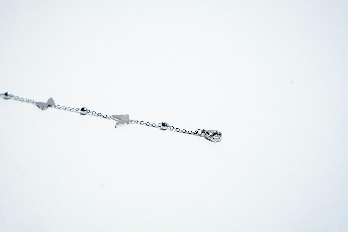 The Whispering Butterfly: 925 Sterling Silver Charm Bracelet