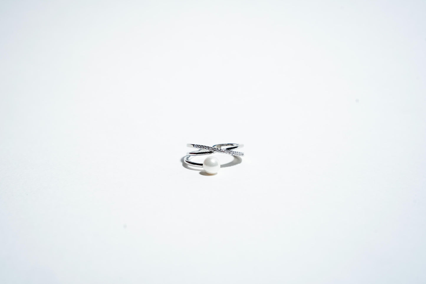 The "Ethereal Intertwine" Pearl & Pavé Crossover Ring