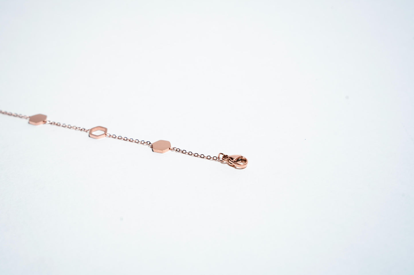 Hexa-Harmony: Premium Rose Gold-Plated Geometric Link Bracelet