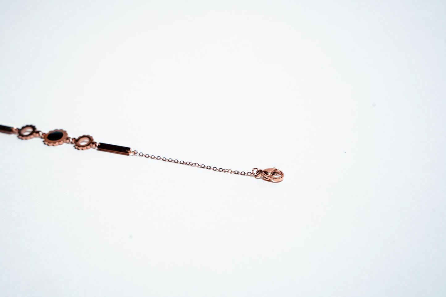 Petals of Grace: Rose Gold-Plated Celestial Link Bracelet