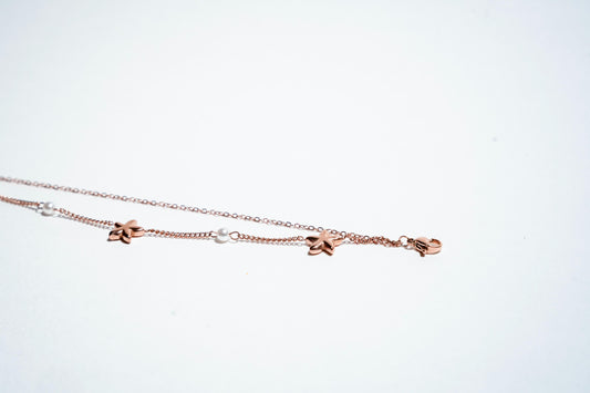 Starlit Dreams: Celestial Pearl & Star Layered Bracelet