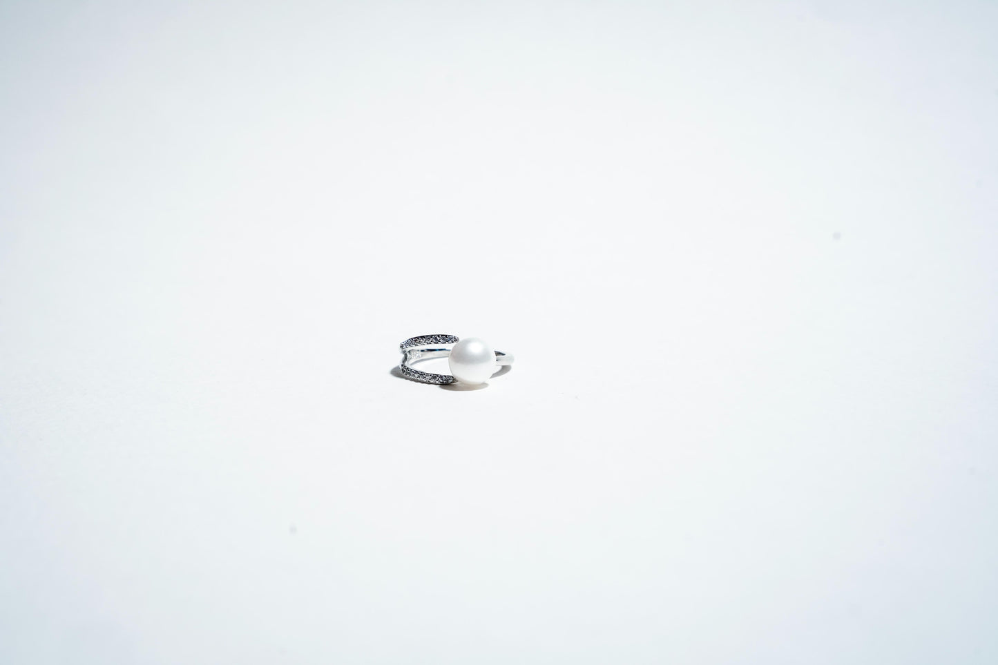 Dual Orbit: The Pavé & Pearl Synchrony Ring