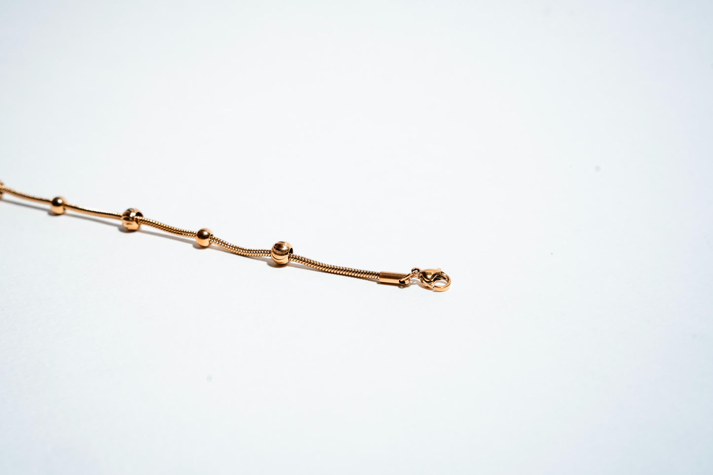 The "Golden Orbit" Snake Chain Bracelet
