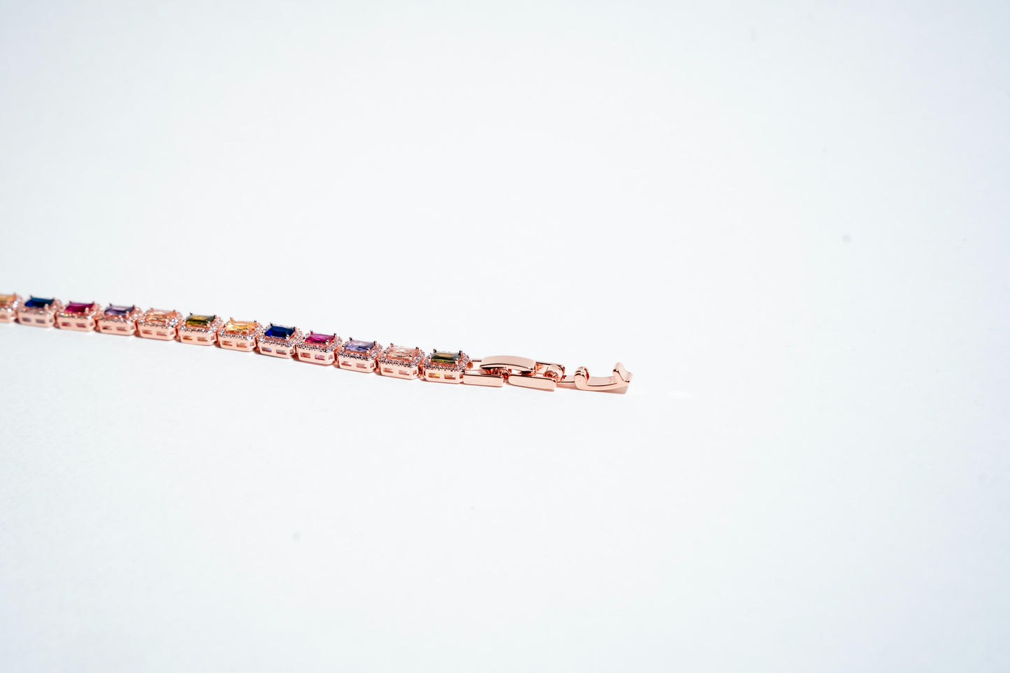 Prism of Joy: Rose Gold-Plated Multi-Color Baguette Tennis Bracelet