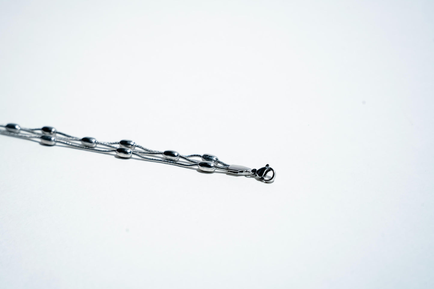 The Ethereal Strand: 925 Sterling Silver Layered Bead Bracelet