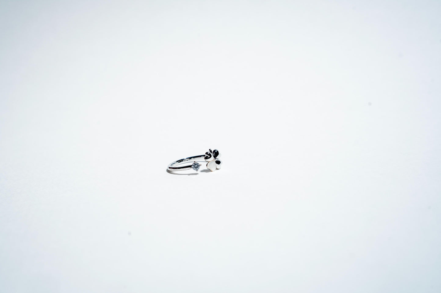 Fortune Bloom: The Lucky Clover Solitaire Ring