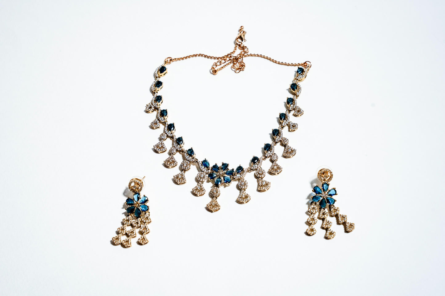Azure Blossom Radiance: 18k Gold-Plated Crystal Floral Necklace & Earring Set