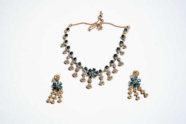 Azure Blossom Radiance: 18k Gold-Plated Crystal Floral Necklace & Earring Set