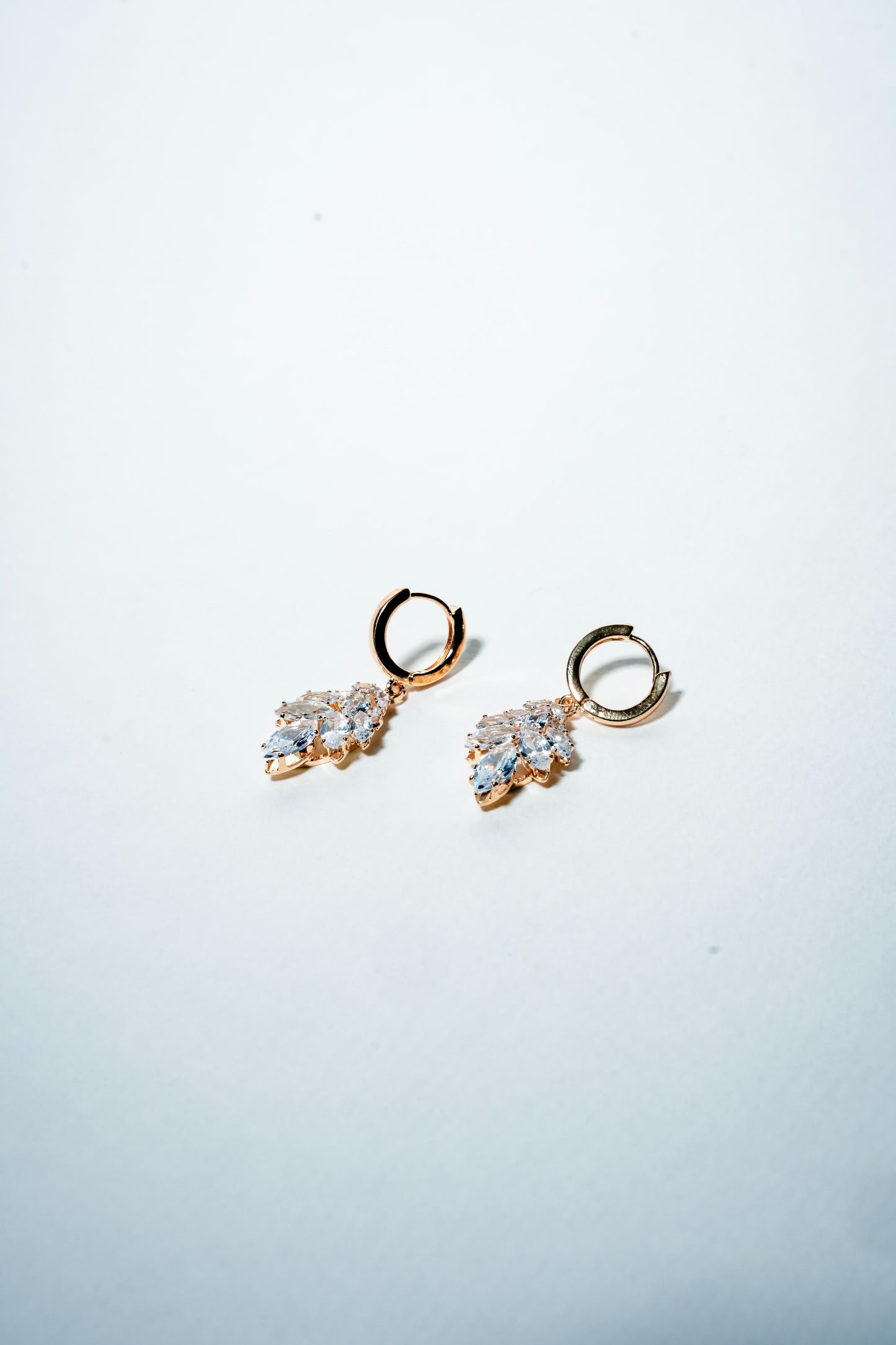 Willow Leaf Huggie Hoops – 18K Gold Plated