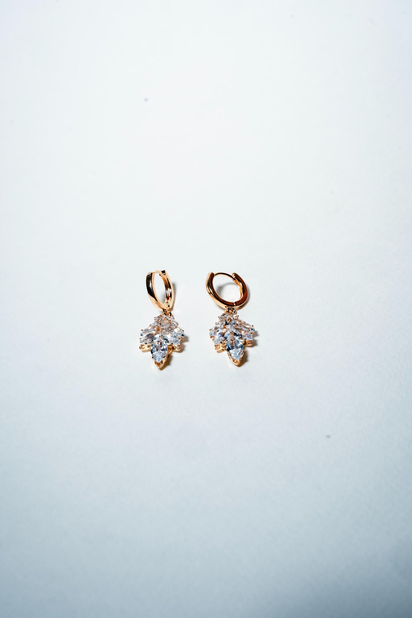 Willow Leaf Huggie Hoops – 18K Gold Plated